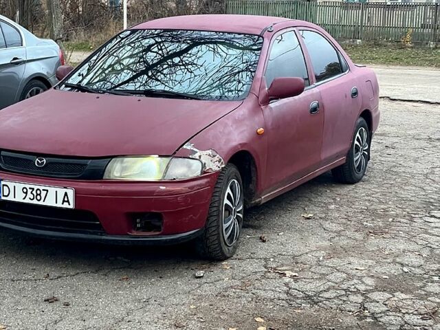 Красный Мазда 323, объемом двигателя 1.5 л и пробегом 0 тыс. км за 1600 $, фото 11 на Automoto.ua