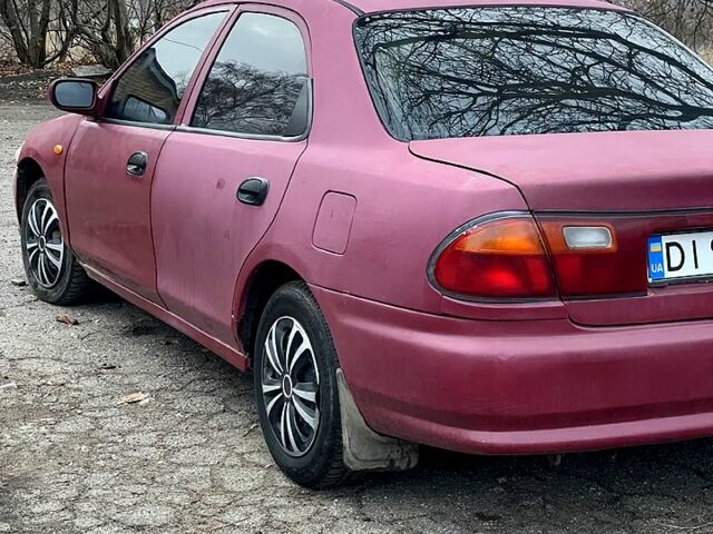 Красный Мазда 323, объемом двигателя 1.5 л и пробегом 0 тыс. км за 1600 $, фото 8 на Automoto.ua