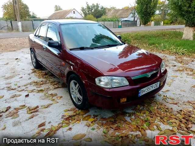 Мазда 323 1999 в Одессе на Automoto.ua Красный Мазда 323, объемом двигателя 1.5 л и пробегом 331 тыс. км за 2700 $, фото 8 на Automoto.ua