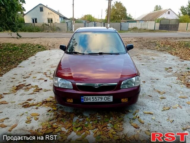 Мазда 323 1999 в Одессе на Automoto.ua Красный Мазда 323, объемом двигателя 1.5 л и пробегом 331 тыс. км за 2700 $, фото 4 на Automoto.ua