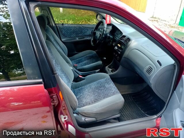 Мазда 323 1999 в Одессе на Automoto.ua Красный Мазда 323, объемом двигателя 1.5 л и пробегом 331 тыс. км за 2700 $, фото 7 на Automoto.ua