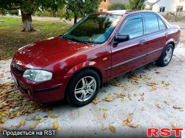 Мазда 323 1999 в Одессе на Automoto.ua Красный Мазда 323, объемом двигателя 1.5 л и пробегом 331 тыс. км за 2700 $, фото 2 на Automoto.ua