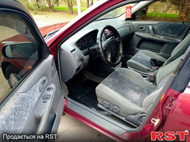 Мазда 323 1999 в Одессе на Automoto.ua Красный Мазда 323, объемом двигателя 1.5 л и пробегом 331 тыс. км за 2700 $, фото 13 на Automoto.ua