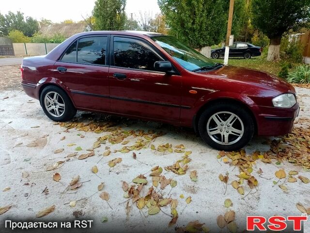 Мазда 323 1999 в Одессе на Automoto.ua Красный Мазда 323, объемом двигателя 1.5 л и пробегом 331 тыс. км за 2700 $, фото 6 на Automoto.ua