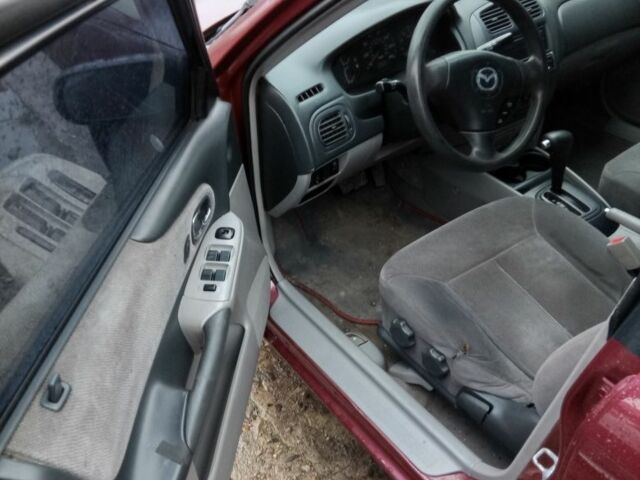 Красный Мазда 323, объемом двигателя 2 л и пробегом 2 тыс. км за 1700 $, фото 4 на Automoto.ua