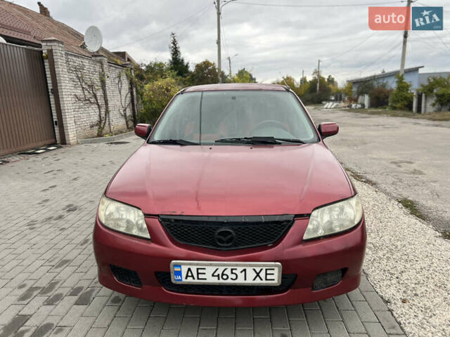Красный Мазда 323, объемом двигателя 1.6 л и пробегом 333 тыс. км за 1500 $, фото 1 на Automoto.ua