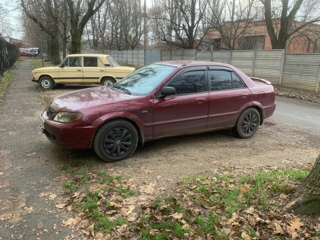 Червоний Мазда 323, об'ємом двигуна 2 л та пробігом 167 тис. км за 2400 $, фото 8 на Automoto.ua