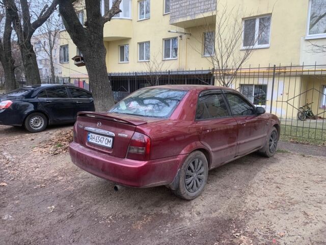 Червоний Мазда 323, об'ємом двигуна 2 л та пробігом 167 тис. км за 2400 $, фото 3 на Automoto.ua