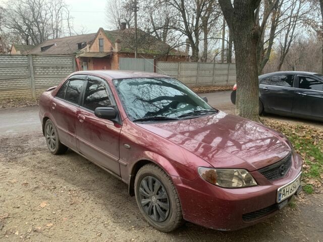 Червоний Мазда 323, об'ємом двигуна 2 л та пробігом 167 тис. км за 2400 $, фото 6 на Automoto.ua
