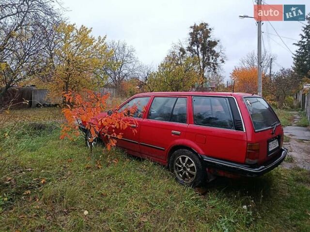 Червоний Мазда 323, об'ємом двигуна 1.49 л та пробігом 350 тис. км за 900 $, фото 1 на Automoto.ua