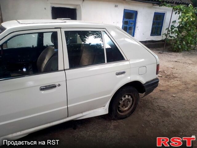 Мазда 323, объемом двигателя 1.7 л и пробегом 250000 тыс. км за 900 $, фото 7 на Automoto.ua