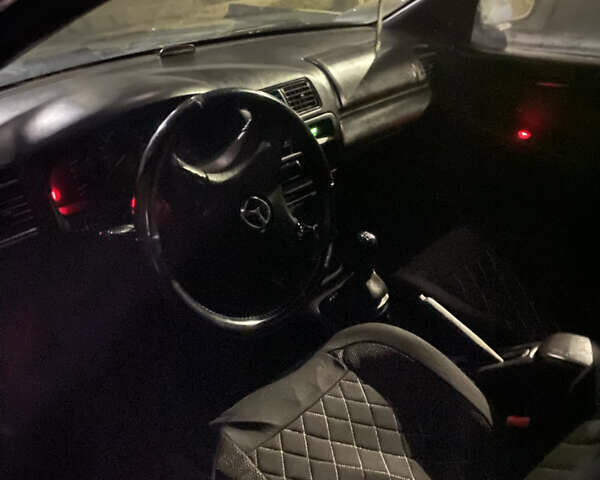 Мазда 323, объемом двигателя 1.5 л и пробегом 200 тыс. км за 1500 $, фото 4 на Automoto.ua