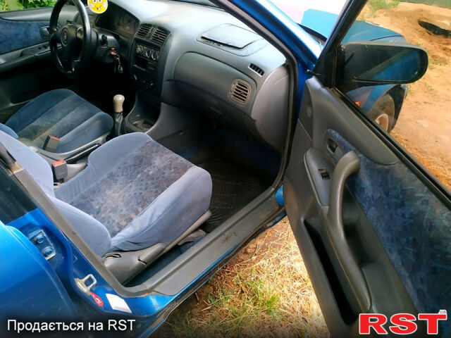 Мазда 323, объемом двигателя 1.5 л и пробегом 333 тыс. км за 700 $, фото 9 на Automoto.ua