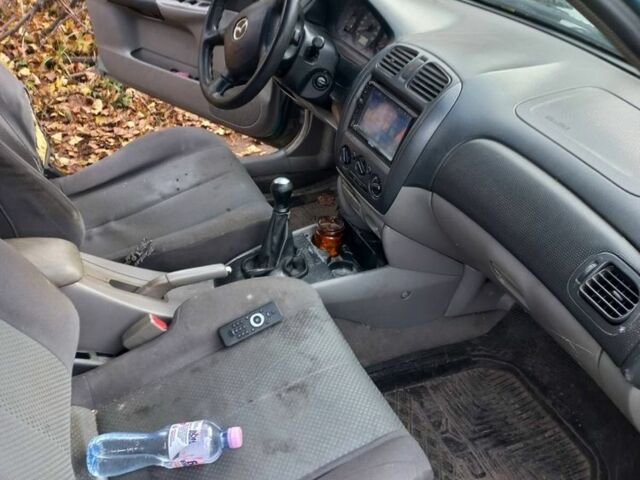 Мазда 323, объемом двигателя 1.6 л и пробегом 360 тыс. км за 1449 $, фото 9 на Automoto.ua