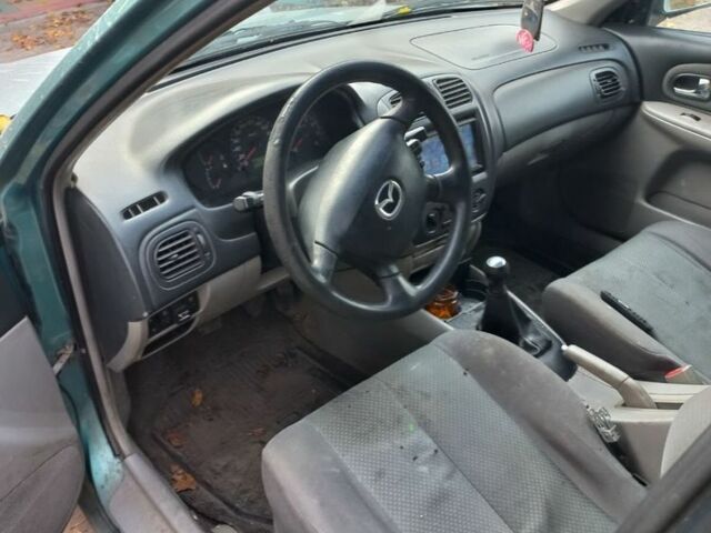 Мазда 323, объемом двигателя 1.6 л и пробегом 360 тыс. км за 1449 $, фото 7 на Automoto.ua