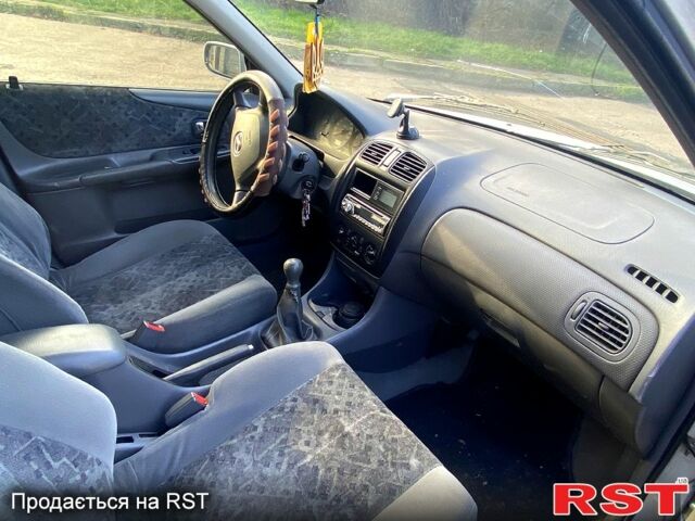 Мазда 323, объемом двигателя 1.3 л и пробегом 250 тыс. км за 2000 $, фото 4 на Automoto.ua