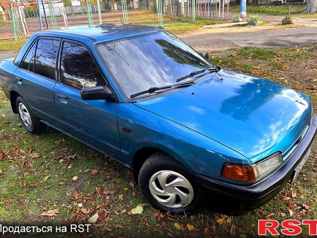 Мазда 323, объемом двигателя 1.3 л и пробегом 200 тыс. км за 1000 $, фото 7 на Automoto.ua