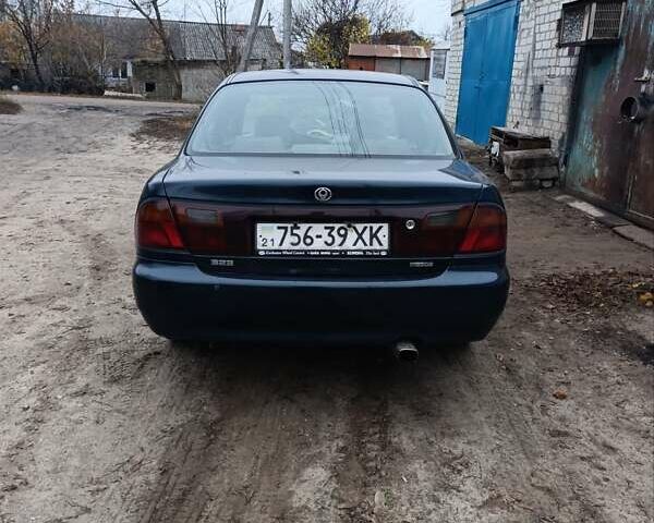 Мазда 323, объемом двигателя 1.5 л и пробегом 463 тыс. км за 2100 $, фото 6 на Automoto.ua