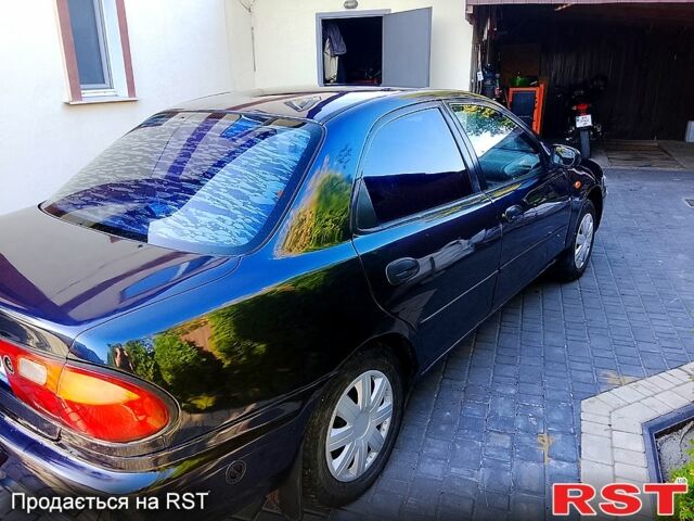 Мазда 323, объемом двигателя 1.6 л и пробегом 80 тыс. км за 1800 $, фото 2 на Automoto.ua