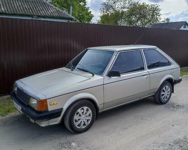 Серый Мазда 323, объемом двигателя 0 л и пробегом 99 тыс. км за 650 $, фото 1 на Automoto.ua