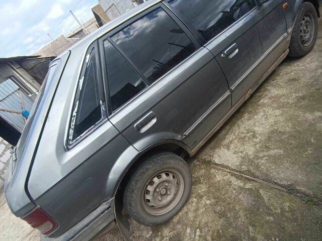 Сірий Мазда 323, об'ємом двигуна 1.5 л та пробігом 400 тис. км за 850 $, фото 4 на Automoto.ua