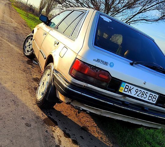 Серый Мазда 323, объемом двигателя 1.3 л и пробегом 454 тыс. км за 850 $, фото 1 на Automoto.ua