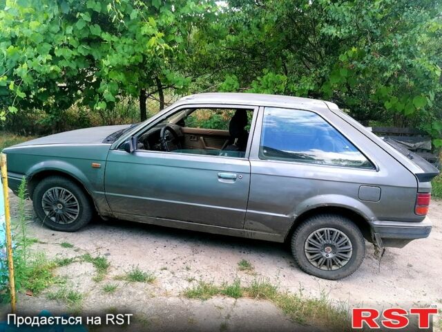 Сірий Мазда 323, об'ємом двигуна 1.5 л та пробігом 500 тис. км за 380 $, фото 4 на Automoto.ua