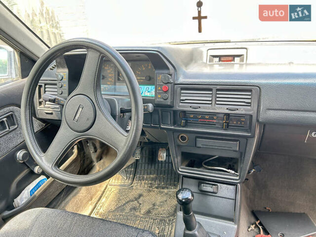 Серый Мазда 323, объемом двигателя 1.3 л и пробегом 200 тыс. км за 1001 $, фото 11 на Automoto.ua