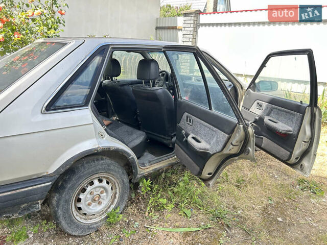 Серый Мазда 323, объемом двигателя 1.3 л и пробегом 200 тыс. км за 1001 $, фото 13 на Automoto.ua