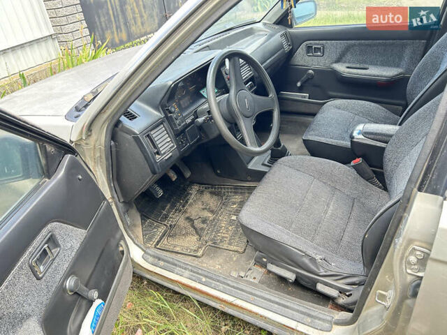 Серый Мазда 323, объемом двигателя 1.3 л и пробегом 200 тыс. км за 1001 $, фото 14 на Automoto.ua