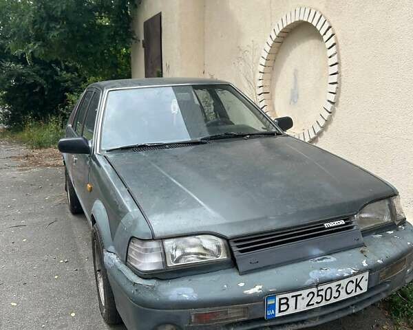 Серый Мазда 323, объемом двигателя 1.32 л и пробегом 342 тыс. км за 1100 $, фото 1 на Automoto.ua
