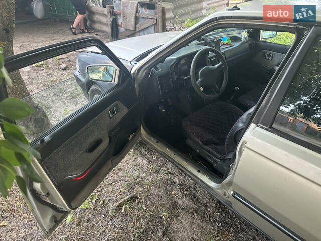 Серый Мазда 323, объемом двигателя 1.32 л и пробегом 153 тыс. км за 1075 $, фото 6 на Automoto.ua
