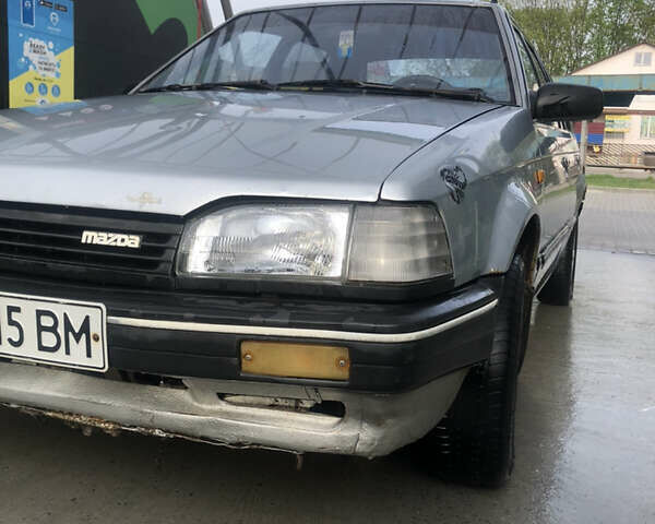 Сірий Мазда 323, об'ємом двигуна 1.3 л та пробігом 250 тис. км за 800 $, фото 1 на Automoto.ua