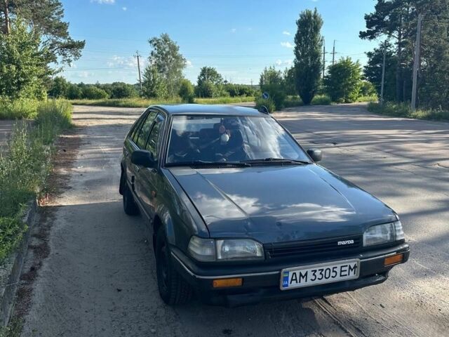 Сірий Мазда 323, об'ємом двигуна 1.5 л та пробігом 254 тис. км за 1052 $, фото 1 на Automoto.ua
