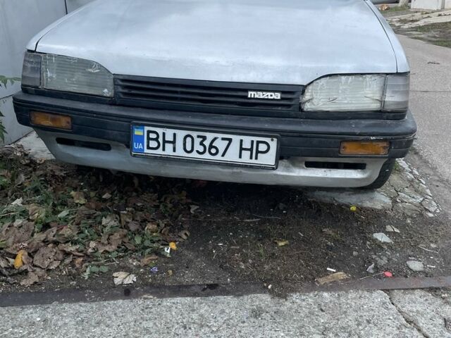 Серый Мазда 323, объемом двигателя 1.3 л и пробегом 3 тыс. км за 650 $, фото 1 на Automoto.ua