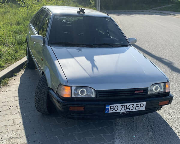 Серый Мазда 323, объемом двигателя 1.32 л и пробегом 460 тыс. км за 1500 $, фото 2 на Automoto.ua