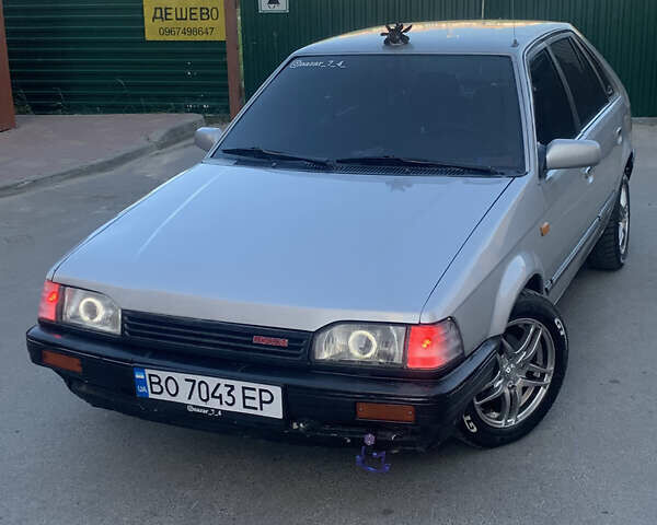 Серый Мазда 323, объемом двигателя 1.32 л и пробегом 460 тыс. км за 1500 $, фото 4 на Automoto.ua