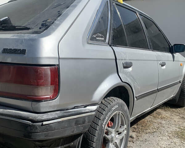 Серый Мазда 323, объемом двигателя 1.32 л и пробегом 460 тыс. км за 1500 $, фото 15 на Automoto.ua
