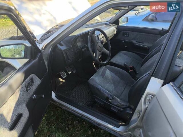 Серый Мазда 323, объемом двигателя 1.3 л и пробегом 212 тыс. км за 300 $, фото 11 на Automoto.ua