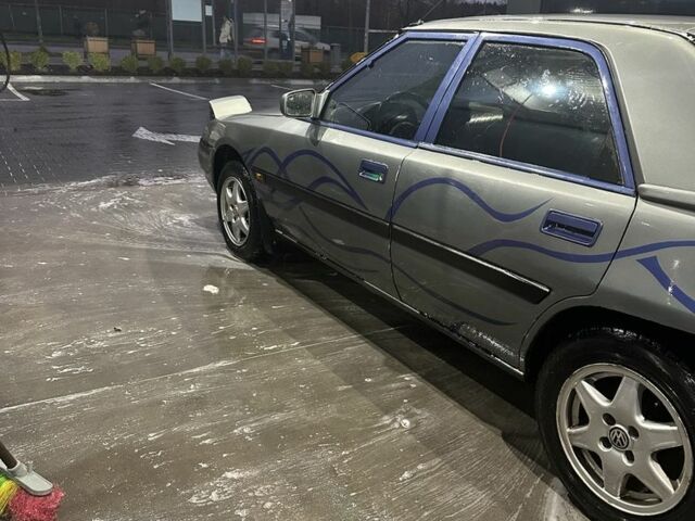 Сірий Мазда 323, об'ємом двигуна 1.8 л та пробігом 350 тис. км за 1400 $, фото 14 на Automoto.ua