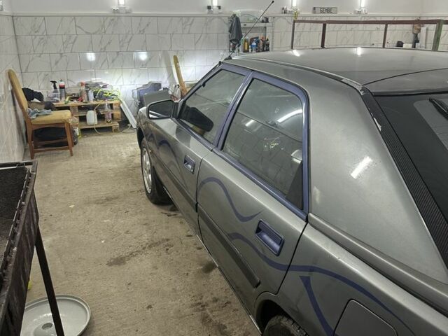 Сірий Мазда 323, об'ємом двигуна 1.8 л та пробігом 350 тис. км за 1400 $, фото 4 на Automoto.ua