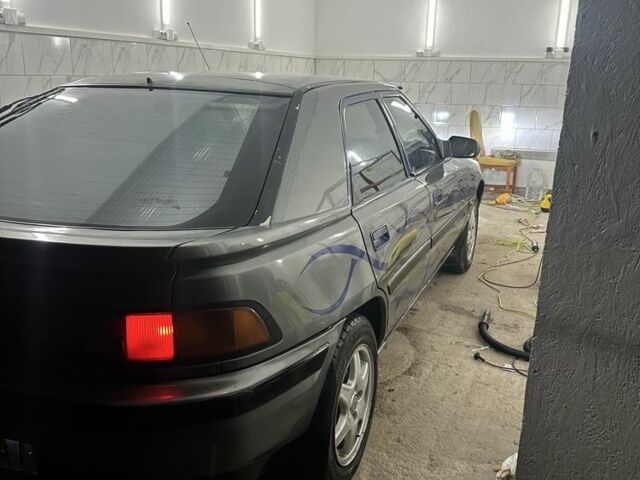 Сірий Мазда 323, об'ємом двигуна 1.8 л та пробігом 350 тис. км за 1400 $, фото 5 на Automoto.ua