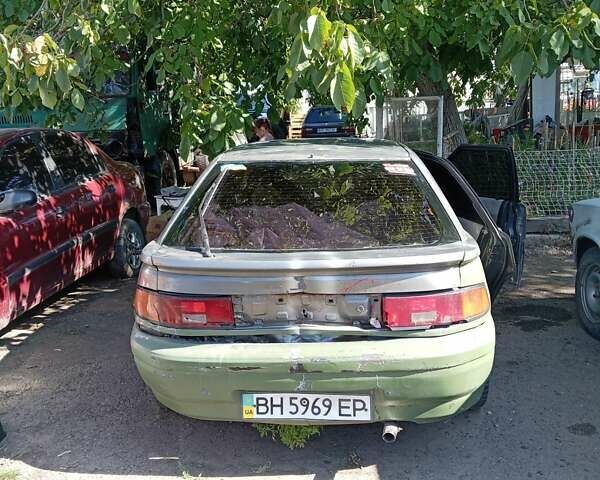 Серый Мазда 323, объемом двигателя 1.6 л и пробегом 300 тыс. км за 688 $, фото 3 на Automoto.ua