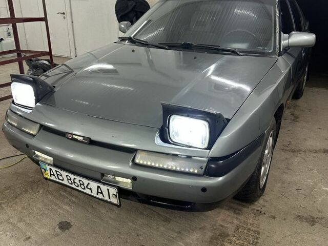 Сірий Мазда 323, об'ємом двигуна 1.8 л та пробігом 350 тис. км за 1400 $, фото 2 на Automoto.ua