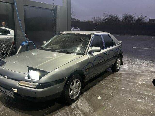 Сірий Мазда 323, об'ємом двигуна 1.8 л та пробігом 350 тис. км за 1400 $, фото 13 на Automoto.ua