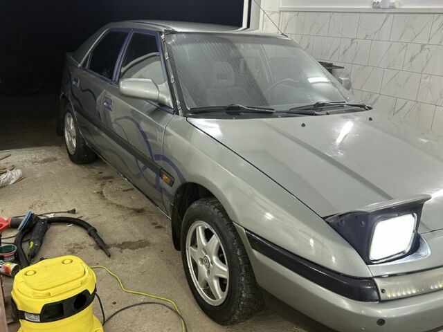 Сірий Мазда 323, об'ємом двигуна 1.8 л та пробігом 350 тис. км за 1400 $, фото 6 на Automoto.ua