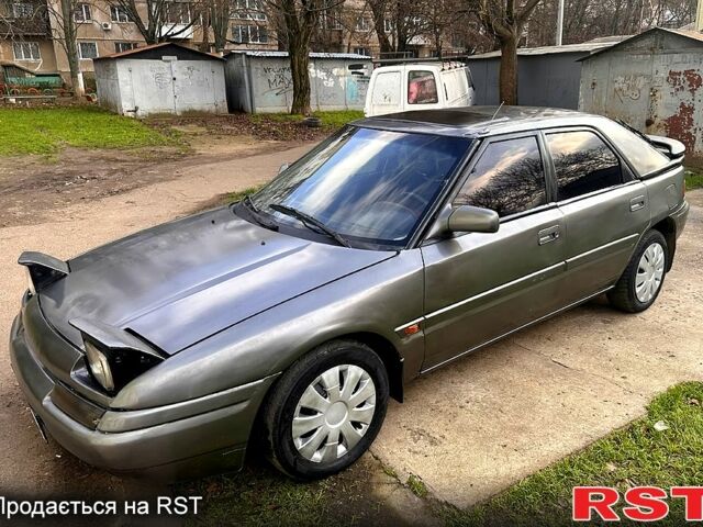 Серый Мазда 323, объемом двигателя 1.6 л и пробегом 220 тыс. км за 1200 $, фото 8 на Automoto.ua