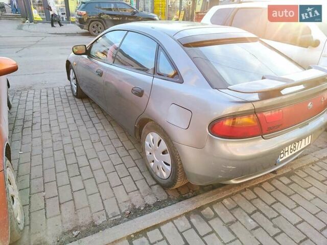 Сірий Мазда 323, об'ємом двигуна 1.6 л та пробігом 293 тис. км за 3000 $, фото 4 на Automoto.ua