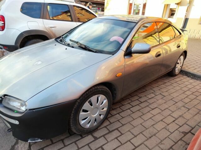 Сірий Мазда 323, об'ємом двигуна 1.5 л та пробігом 293 тис. км за 3000 $, фото 1 на Automoto.ua