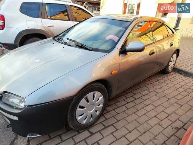 Сірий Мазда 323, об'ємом двигуна 1.6 л та пробігом 293 тис. км за 3000 $, фото 3 на Automoto.ua